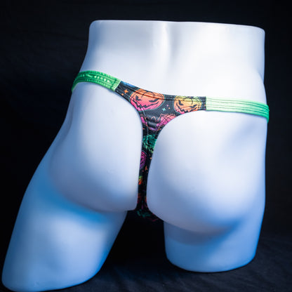 Men's colorful Jack O' Lanterns thong underwear, classic cut, rear view.