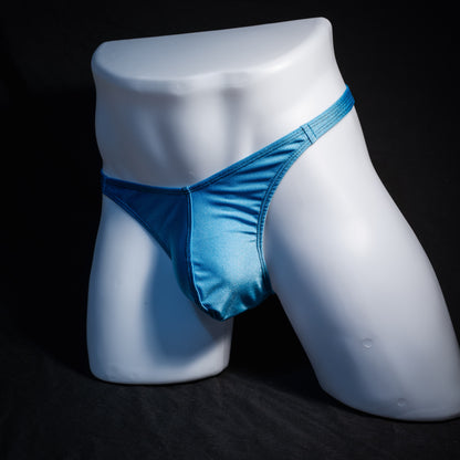 Men's columbia blue thong underwear, classic cut, front view.