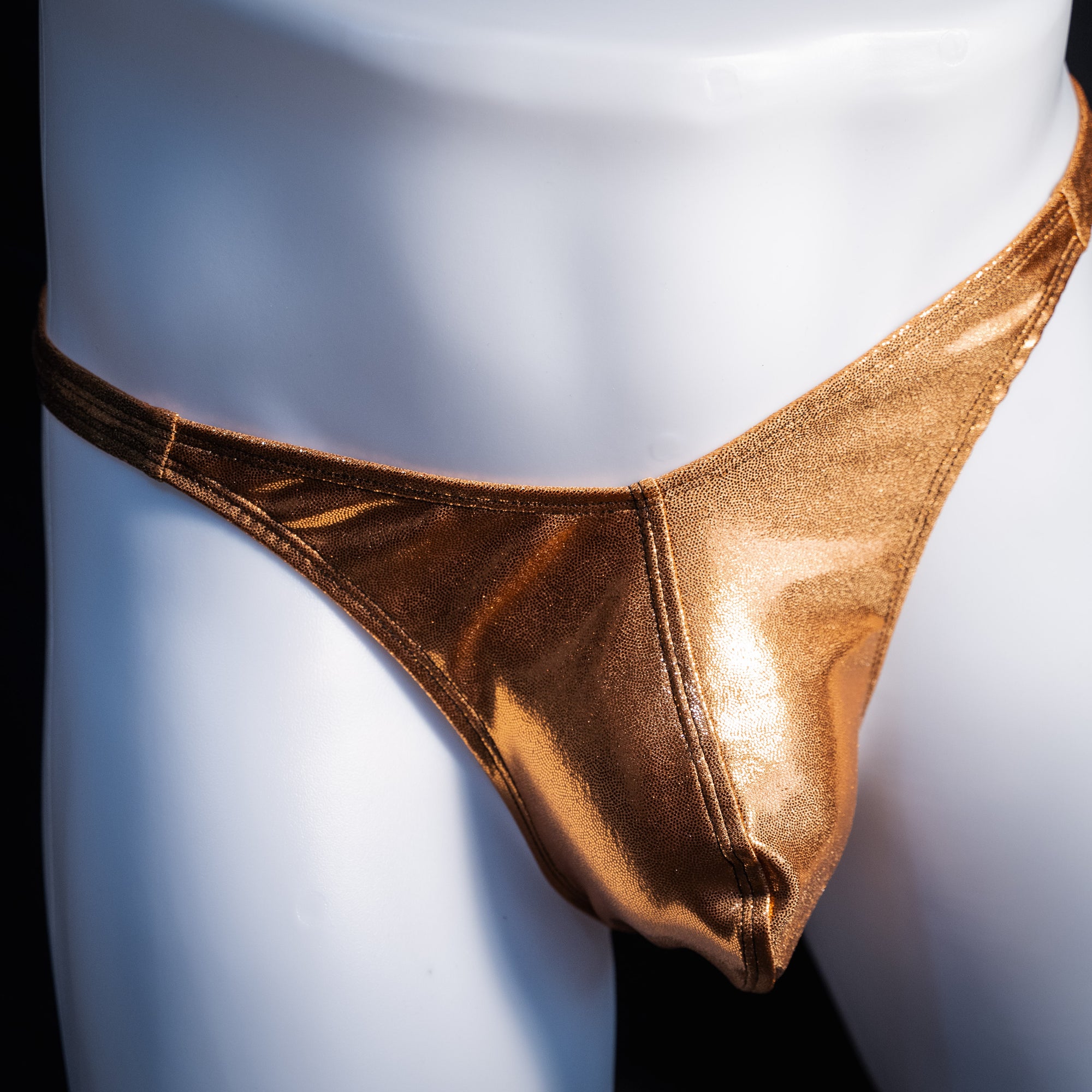 Men's metallic copper thong underwear, classic cut, front view.
