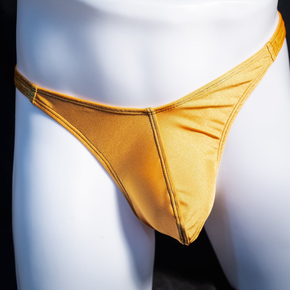 Men's copper spandex thong underwear, classic cut, front view.