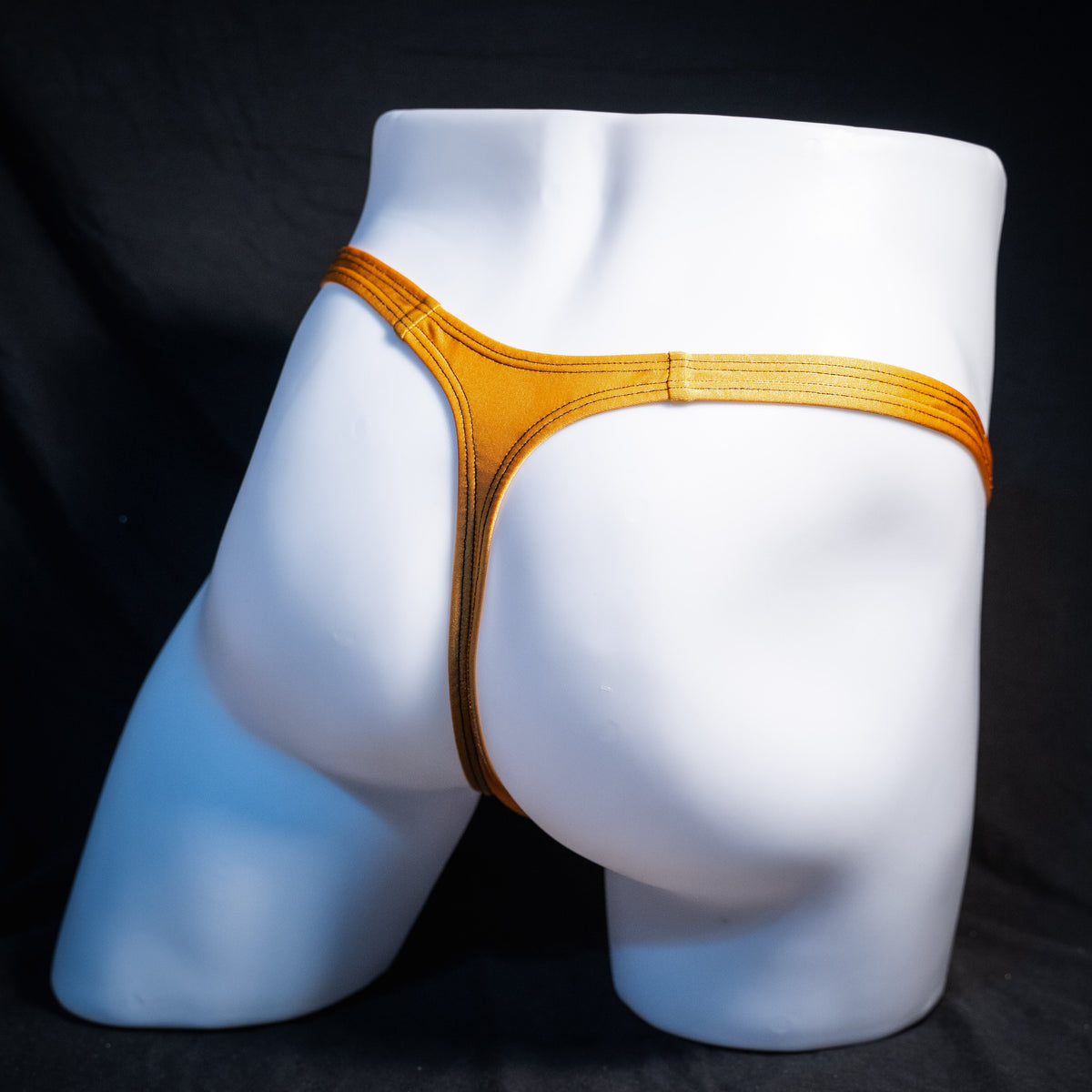 Men's copper spandex thong underwear, classic cut, rear view.