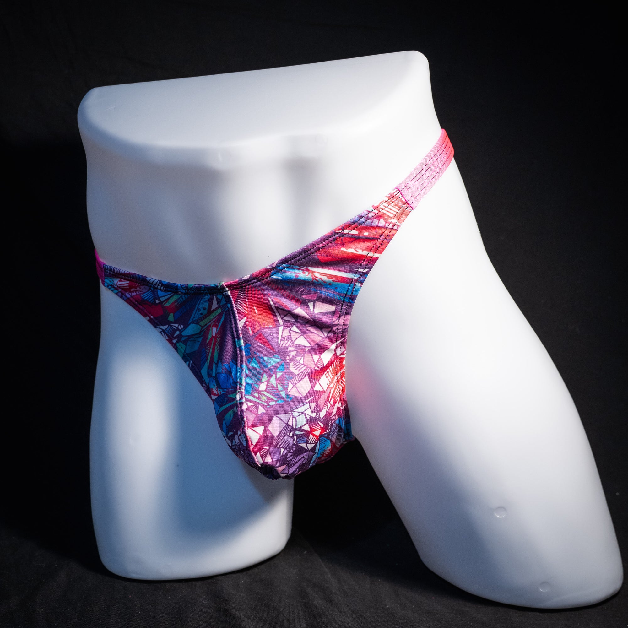 Men's crystal shard thong underwear with pink straps, classic cut, front view.