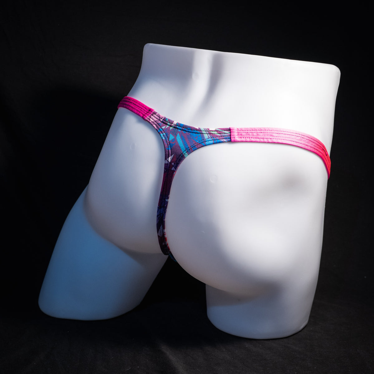 Men's crystal shard thong underwear with pink straps, classic cut, rear view.