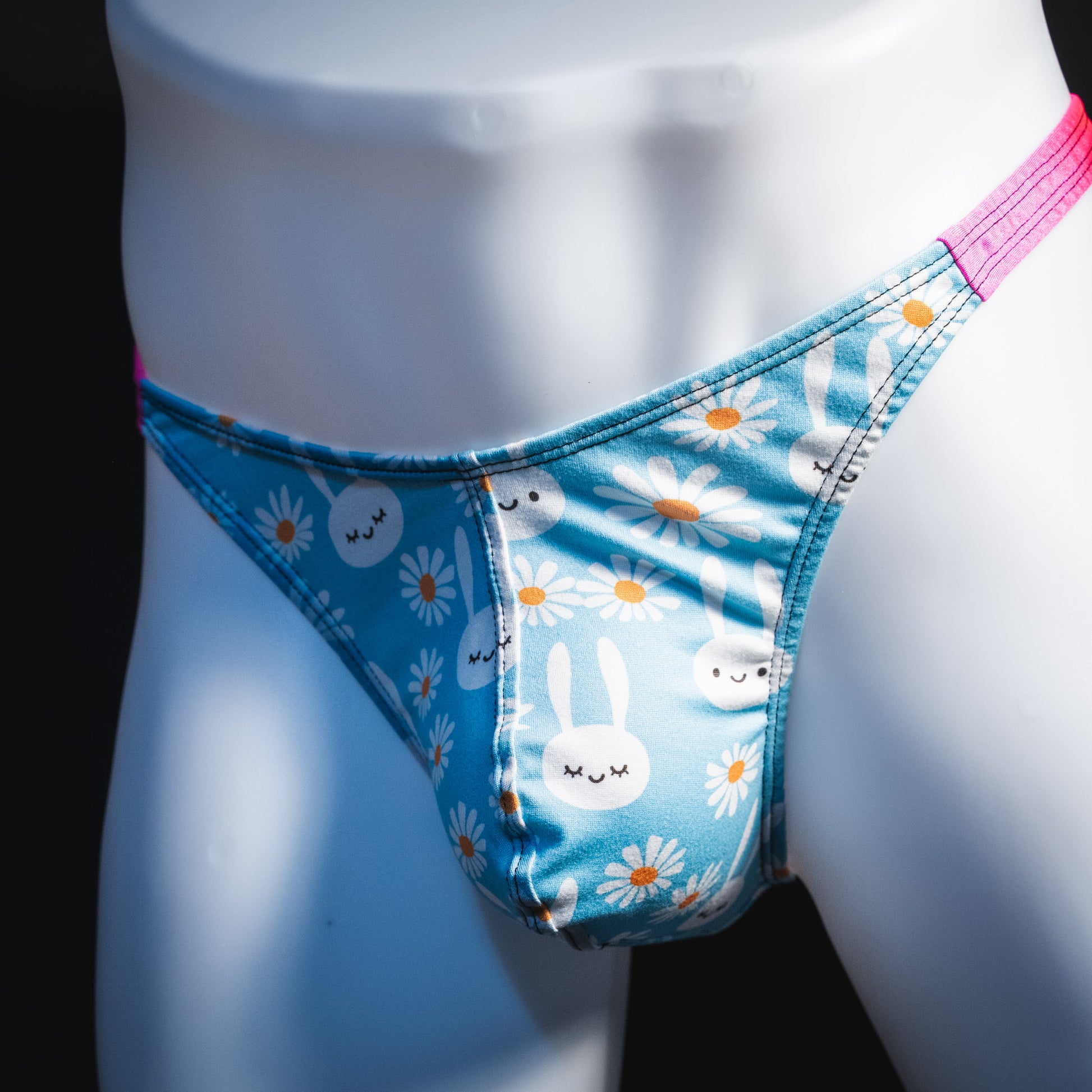Men's easter bunnies thong underwear, classic cut, front angled view.