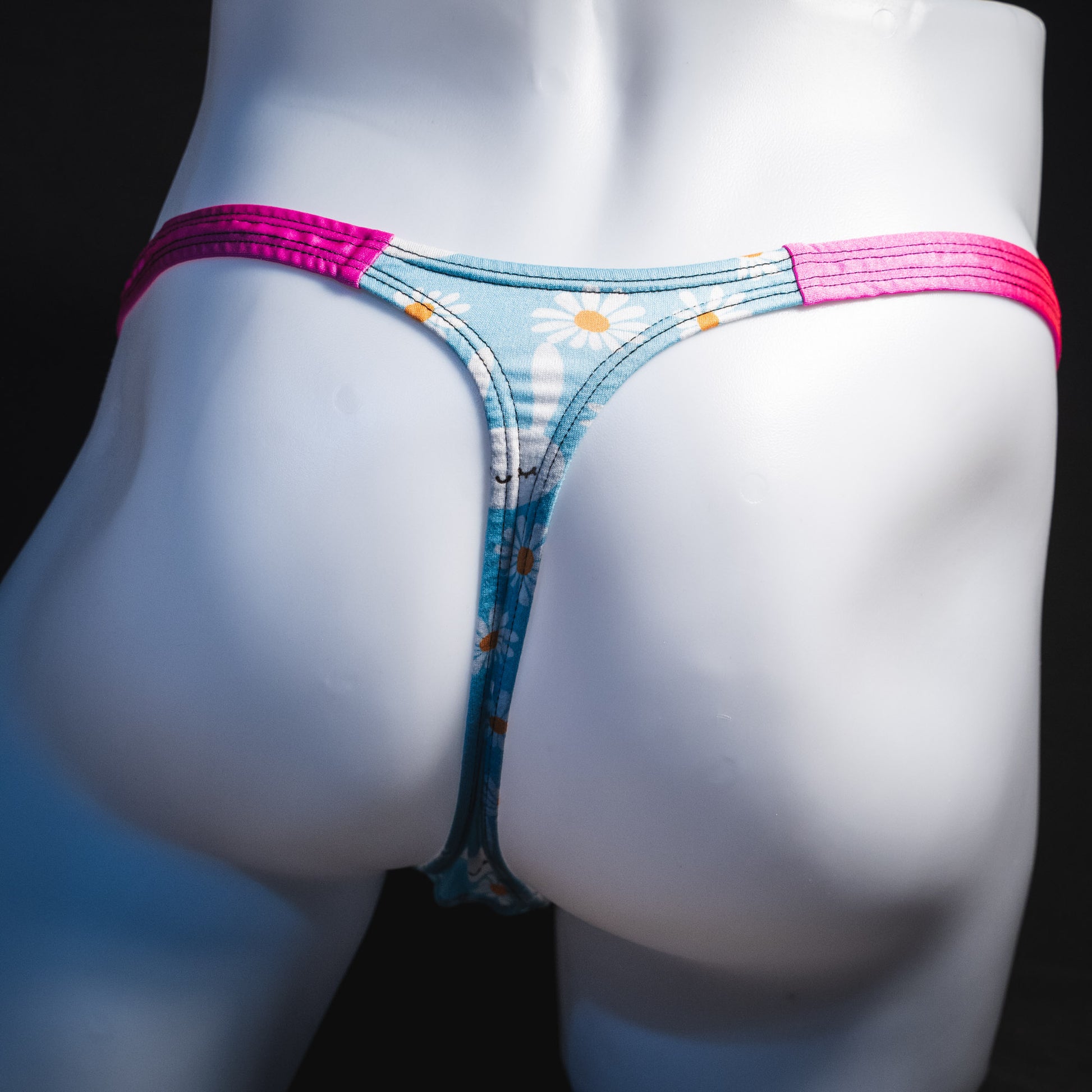 Men's easter bunnies thong underwear, classic cut, rear view.