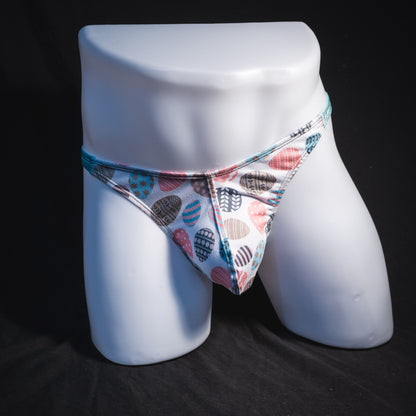 Men's Easter eggs thong underwear, classic cut, full front view.