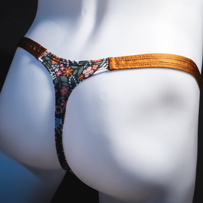 Men's easter themed thong underwear, classic cut, rear angled view.