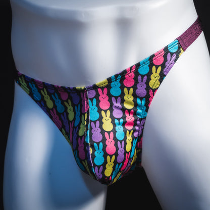 Men's colorful bunnies thong underwear, classic cut, front angled view.