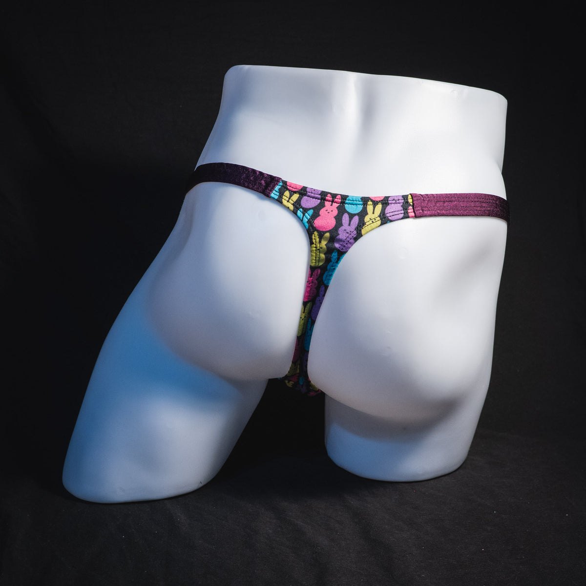 Men's colorful bunnies thong underwear, classic cut, full rear view.
