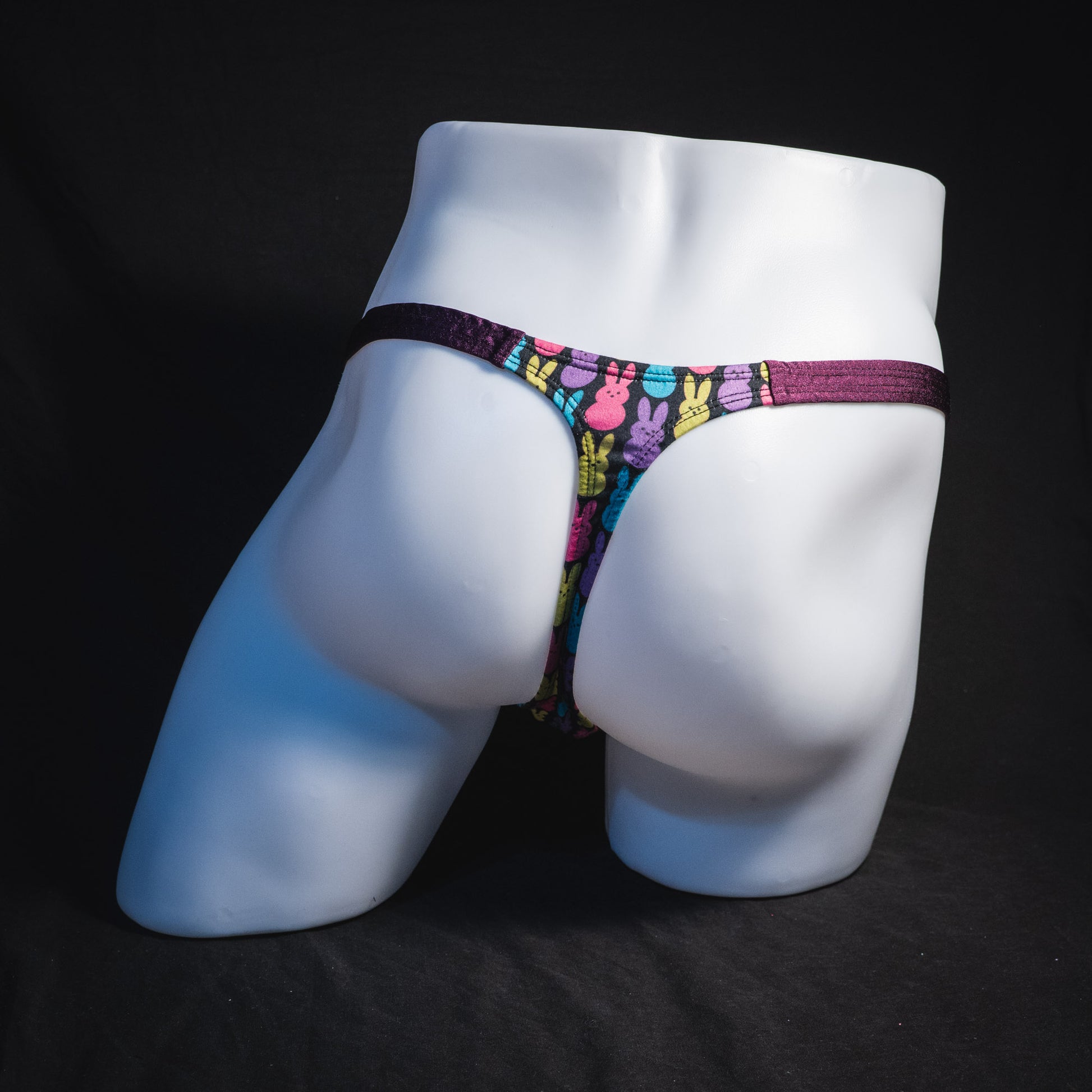 Men's colorful bunnies thong underwear, classic cut, full rear view.