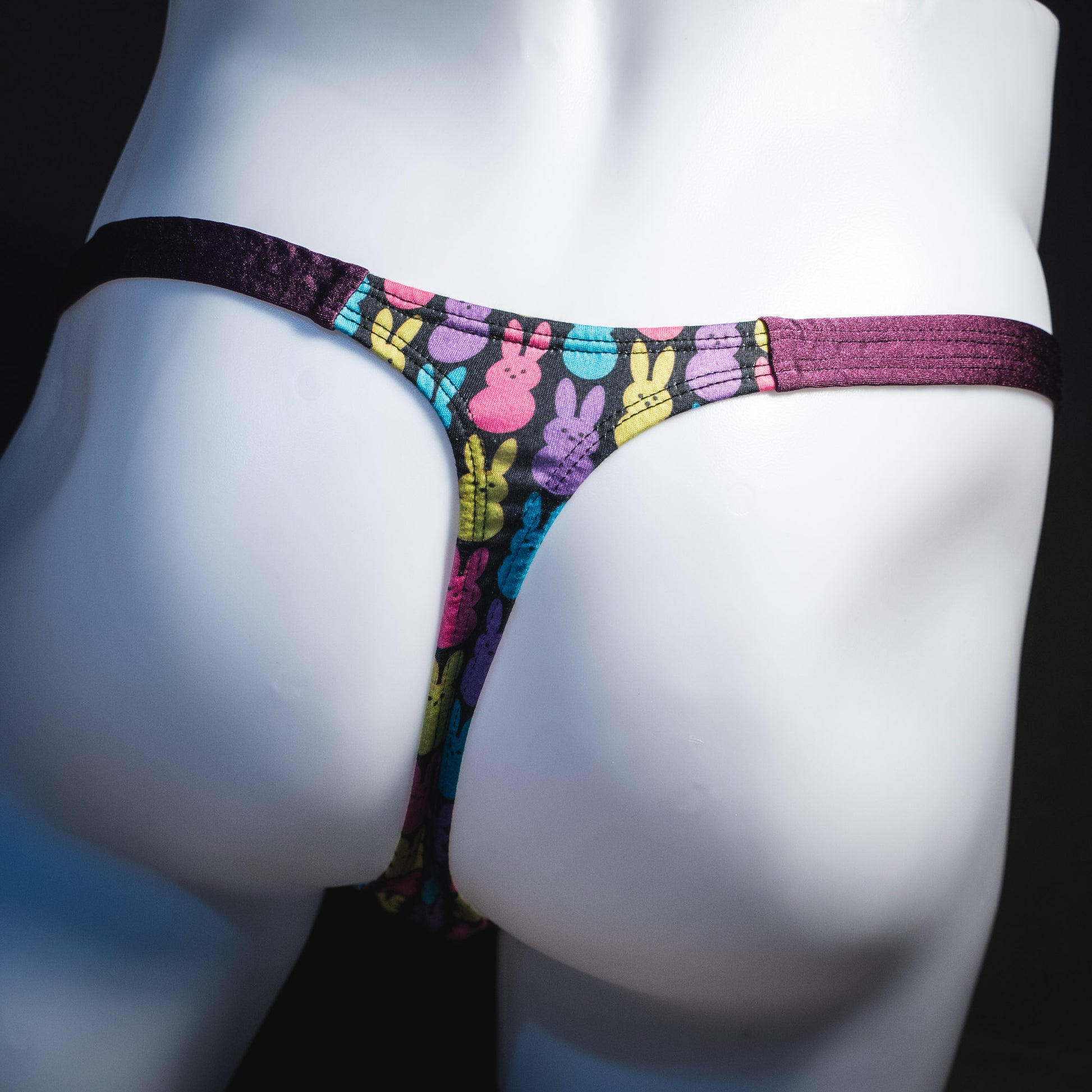 Men's colorful bunnies thong underwear, classic cut, rear view.