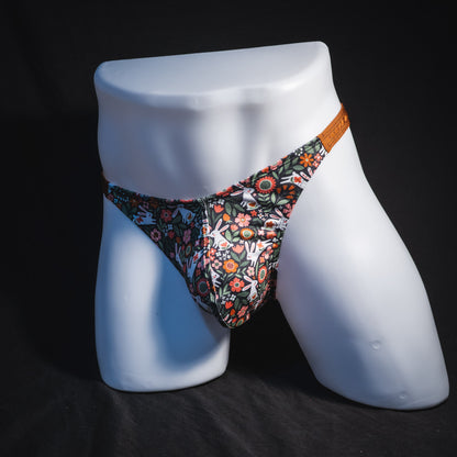 Men's easter themed thong underwear, classic cut, full front angled view.