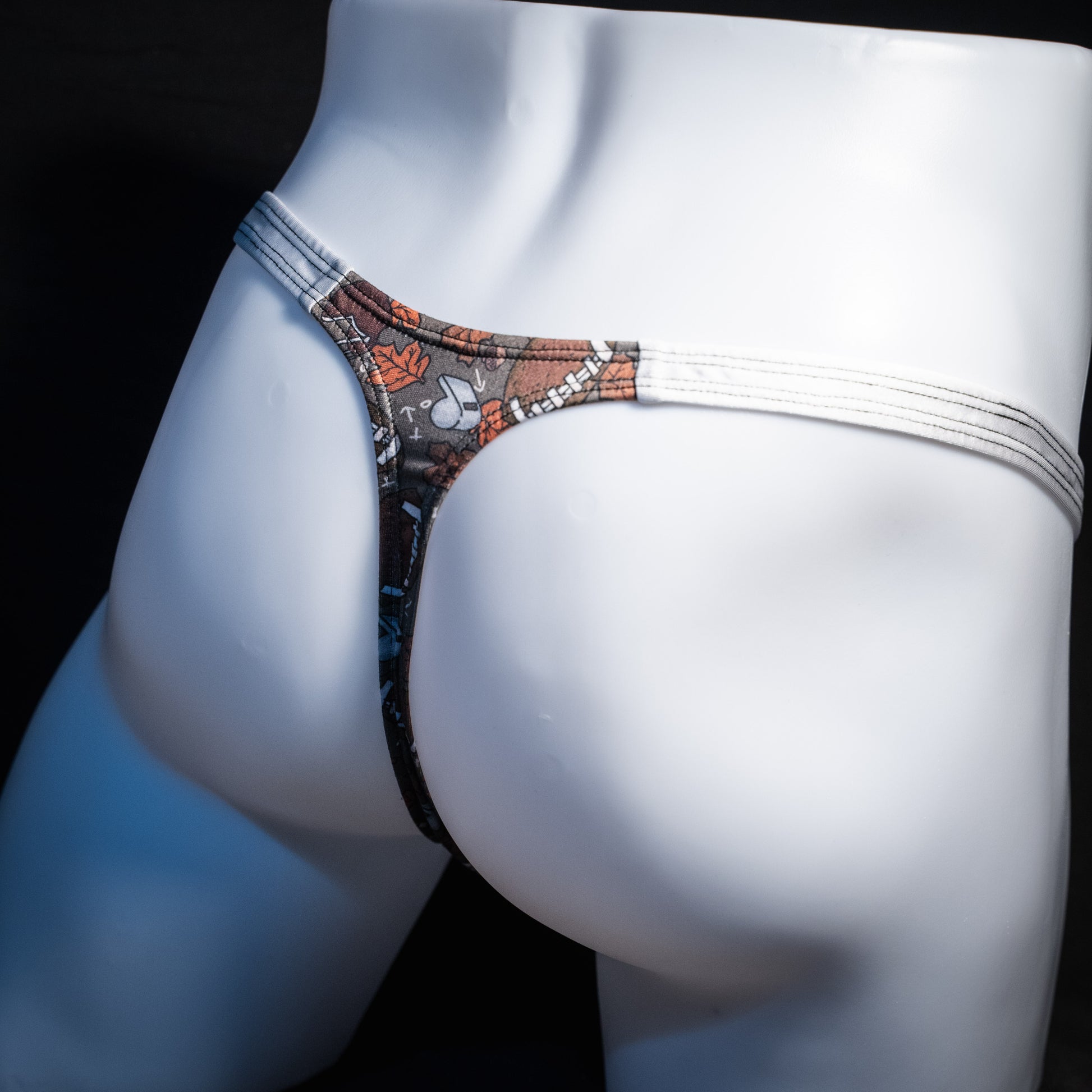 Men's football themed thong underwear, classic cut, rear view.