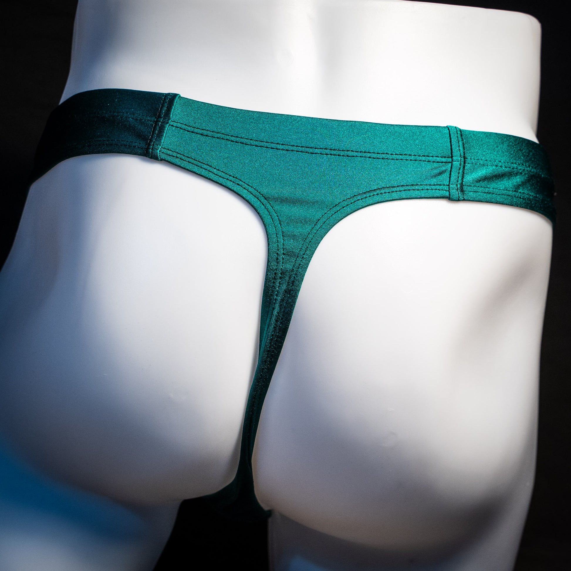 Men's pouchless forest green thong underwear, Rear view