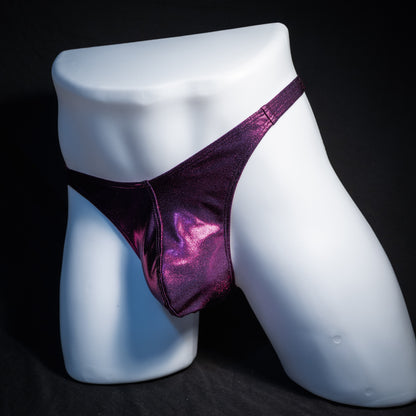 Men's fuchsia metallic thong underwear, classic cut, front view.