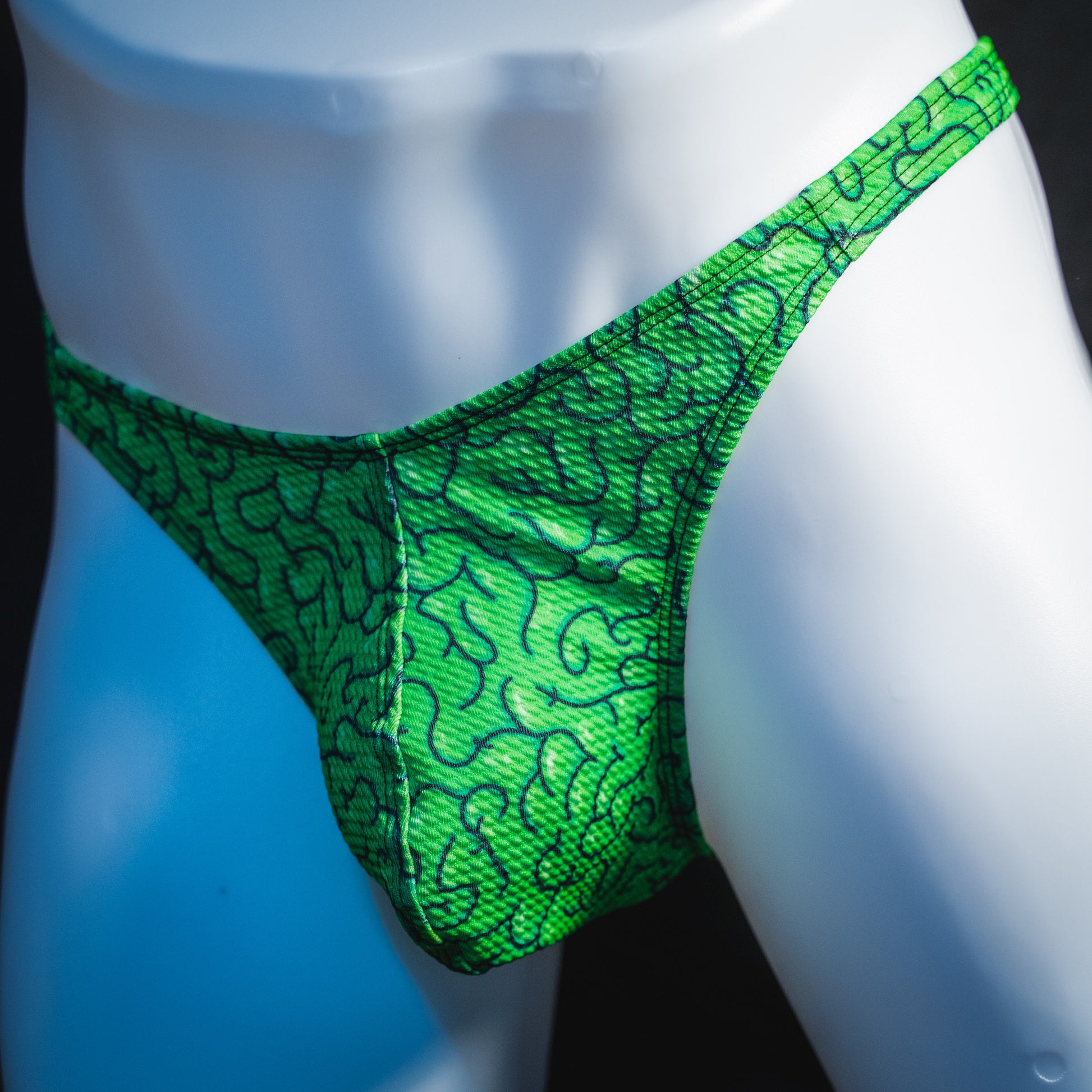 Men's green brains thong underwear, classic cut.