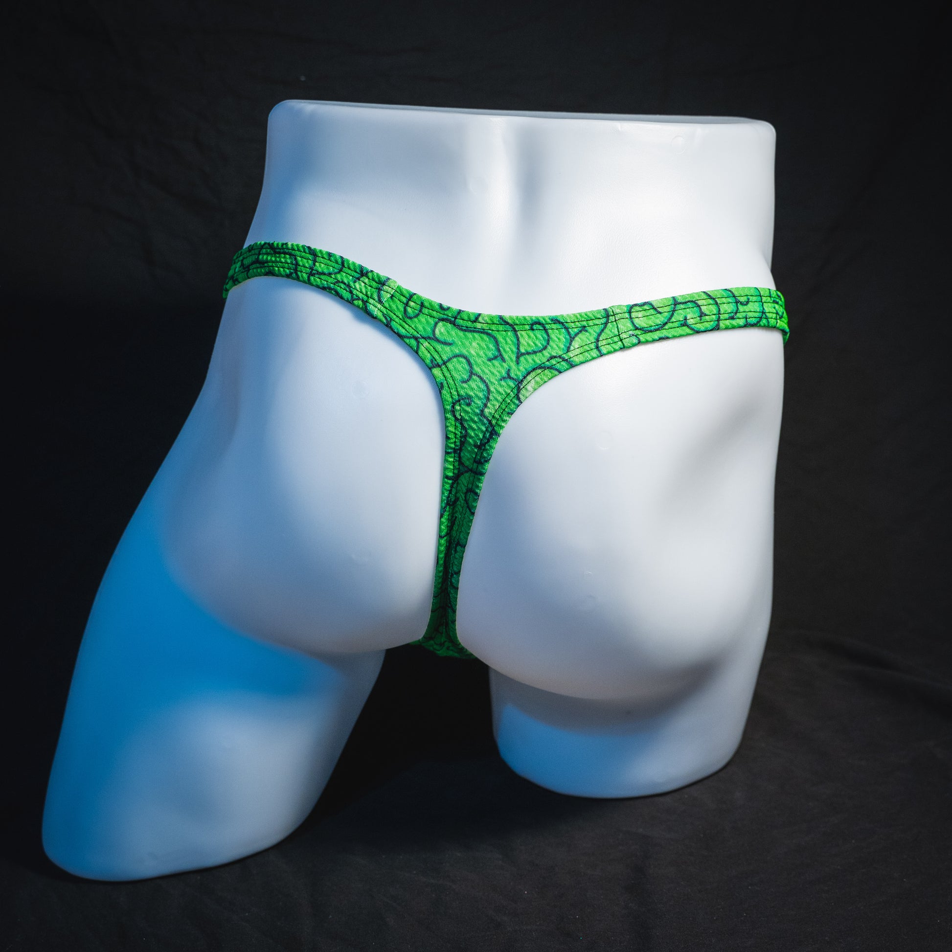 Men's green brains thong underwear, classic cut.