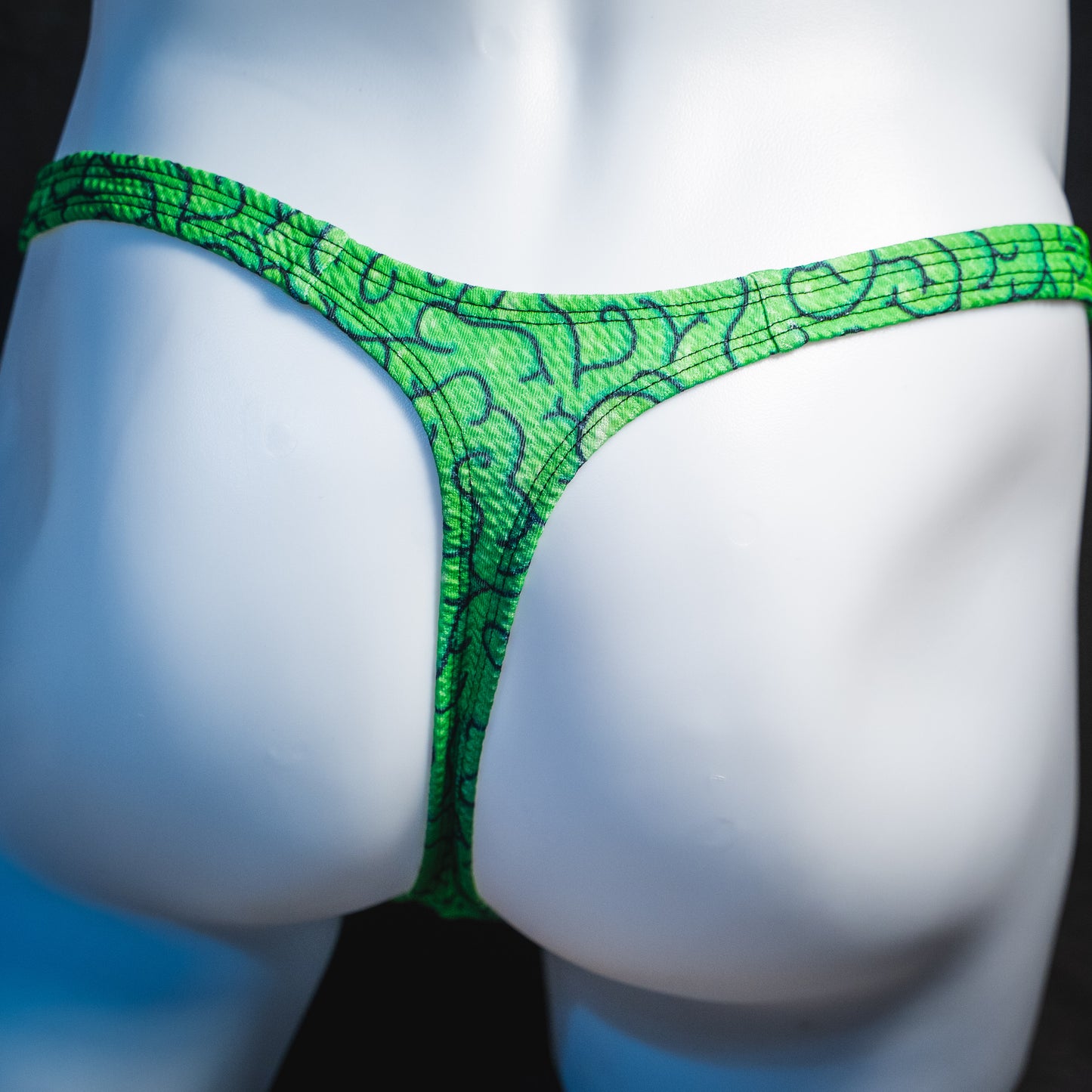 Men's green brains thong underwear, classic cut.