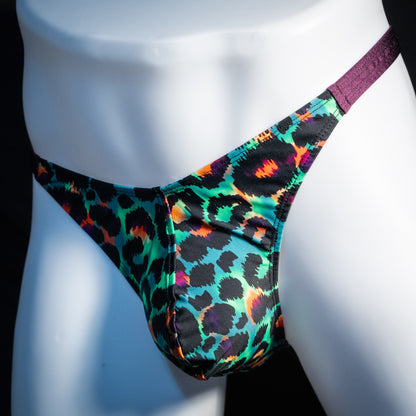 Men's green cheetah thong underwear, classic cut, front view.