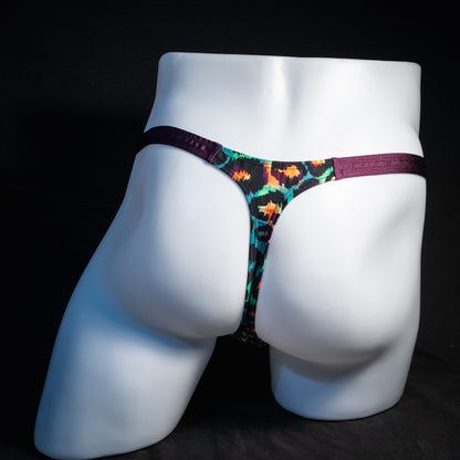 Men's green cheetah thong underwear, classic cut, rear view.