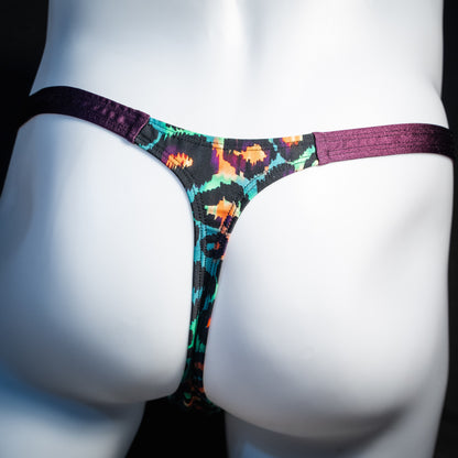 Men's green cheetah thong underwear, classic cut, rear view.