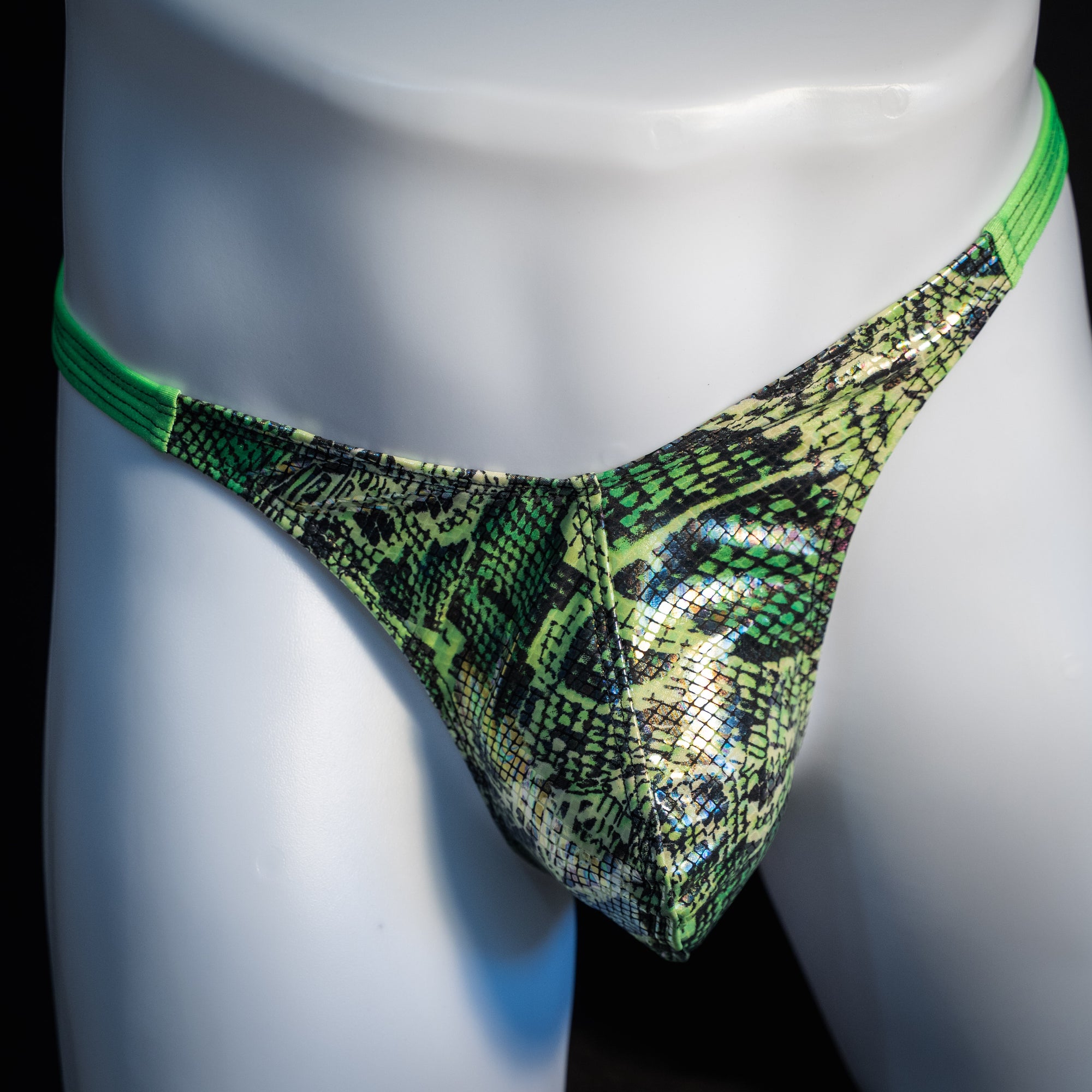 Men's green metallic snakeskin thong underwear, classic cut, front view.