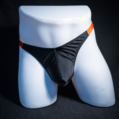Men's Halloween black and orange thong underwear, classic cut, front view.
