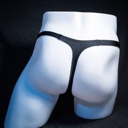 Men's Halloween orange and black thong underwear, classic cut, rear view.