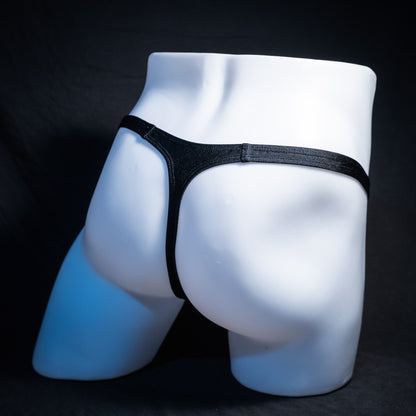 Men's Halloween orange and black thong underwear, classic cut, rear view.