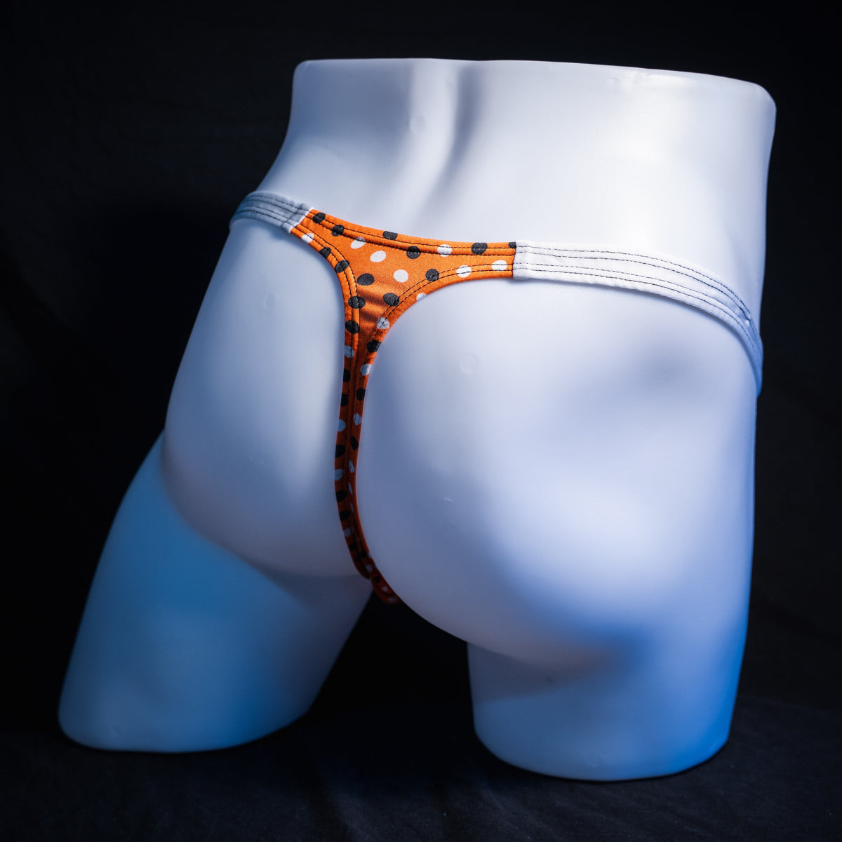 Men's Halloween polka dot thong underwear, classic cut, rear view.