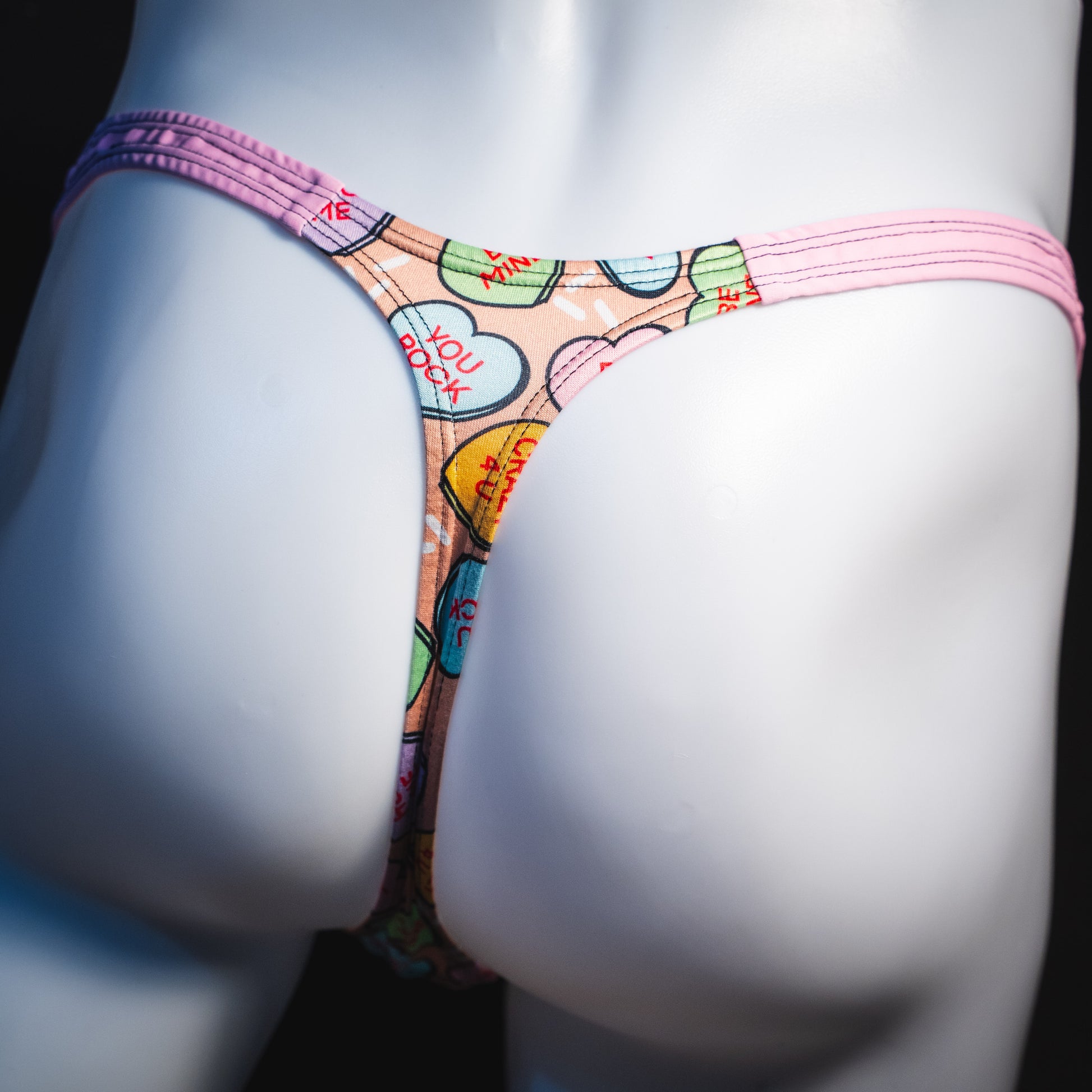 Men's Valentine Day Heart candies thong Underwear, Classic cut, rear view.