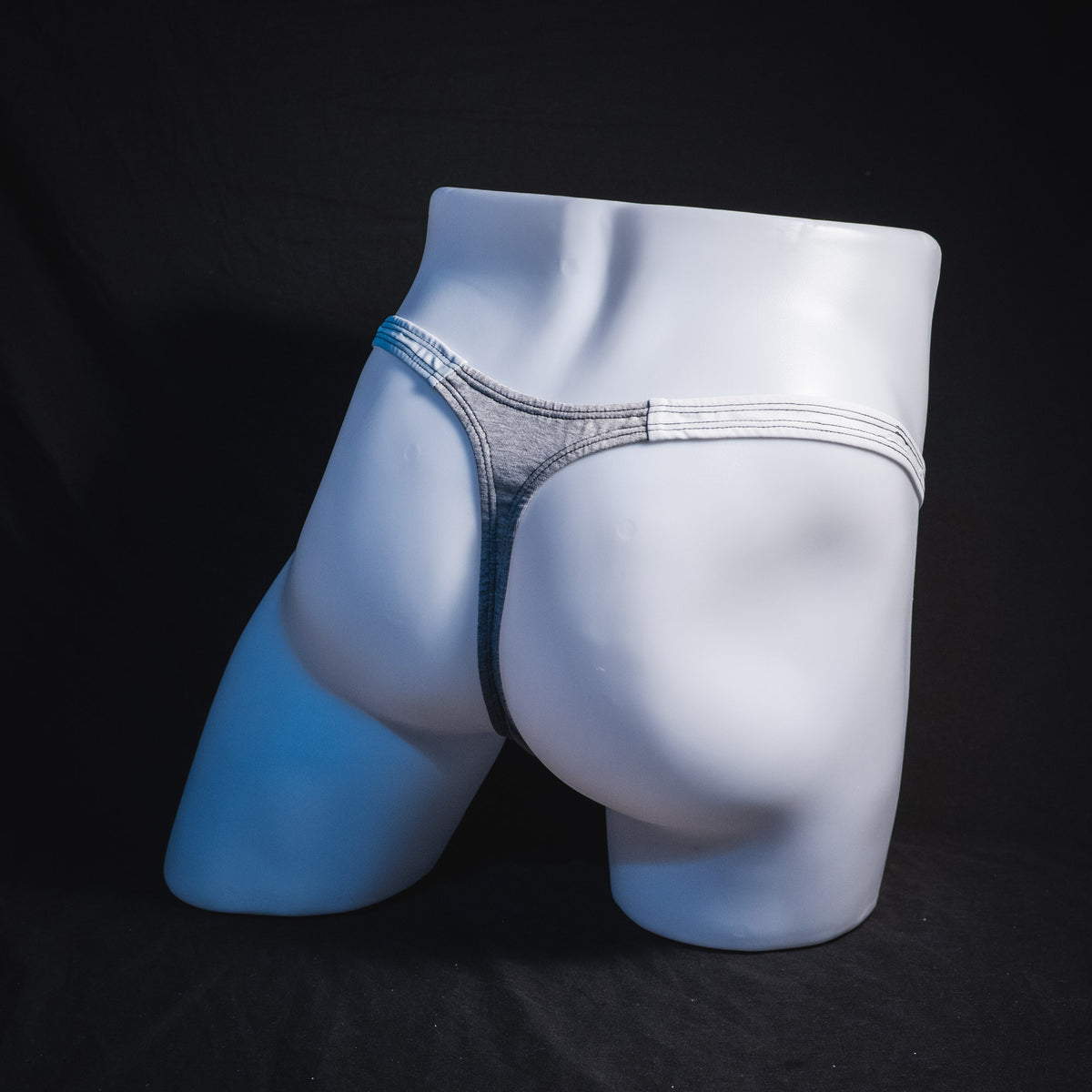 Men's heather gray and white modal thong underwear, classic cut, Full angled rear view