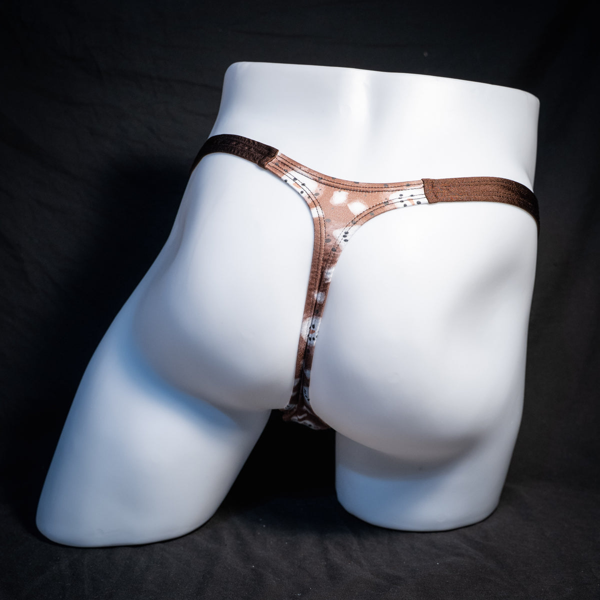 Men's hot chocolate snowmen themed thong underwear, classic cut, rear view.