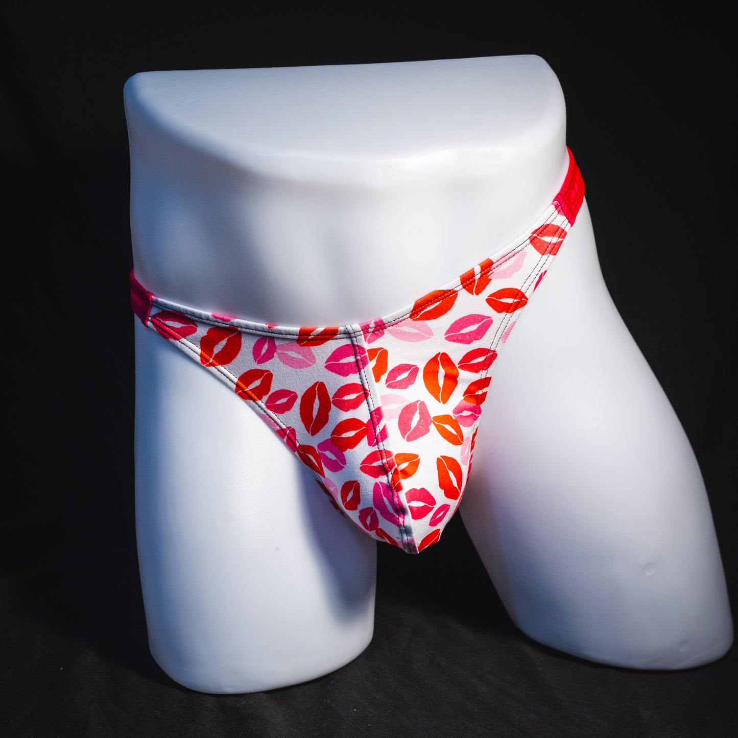 Men's Valentine's Day lips thong underwear, classic cut, full front view.