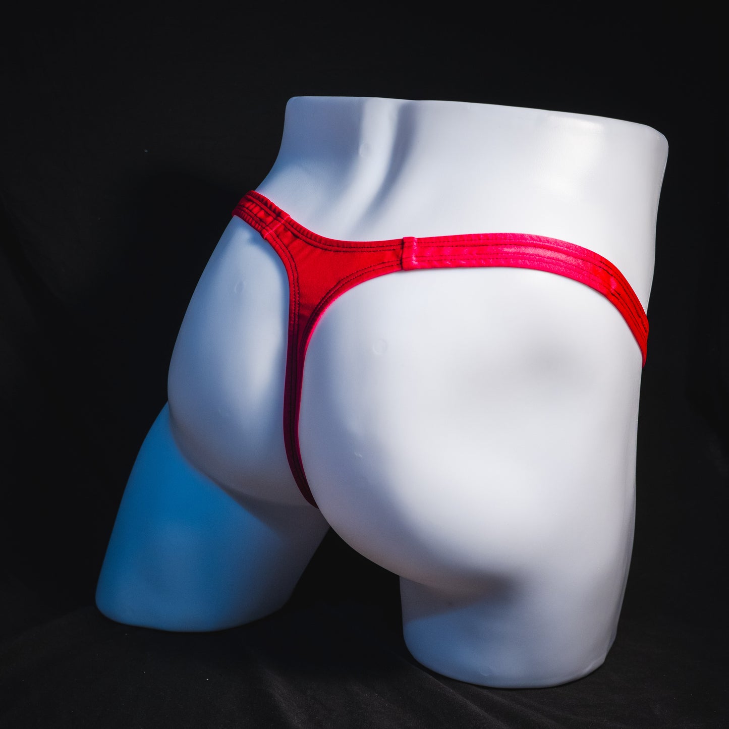 Men's Valentine's Day lips thong underwear, classic cut, full angled rear view.