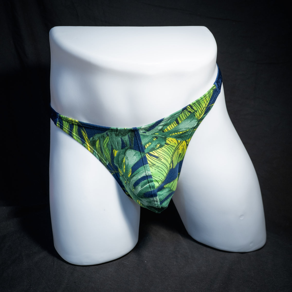Men's jungle leaves thong underwear, classic cut, front view.