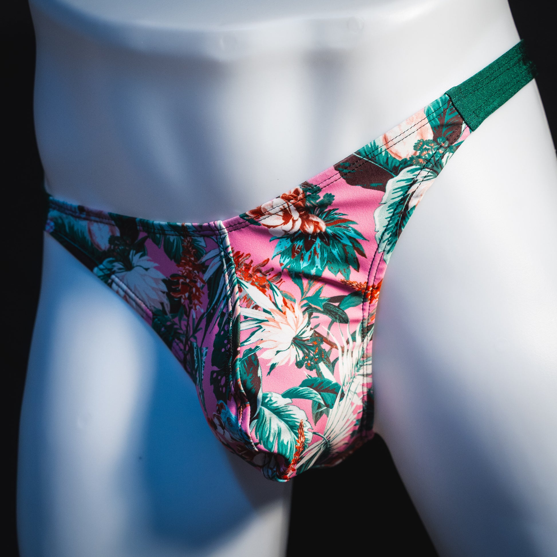 Men's jungle surge thong underwear, classic cut, angled front view.