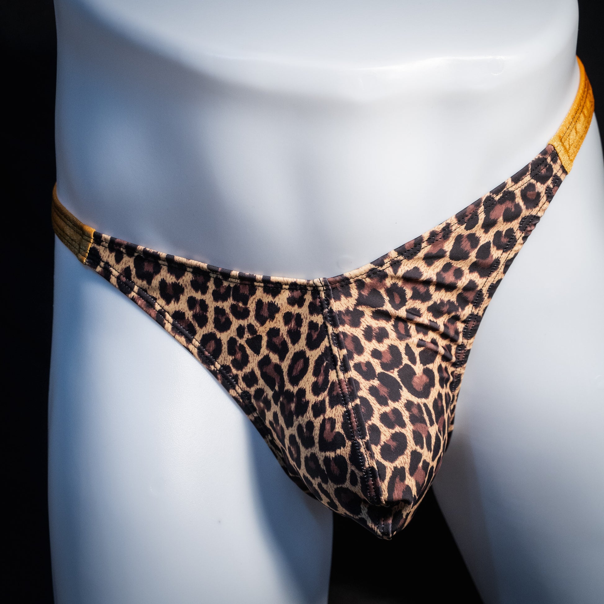 Men's leopard print thong underwear, classic cut, front view.