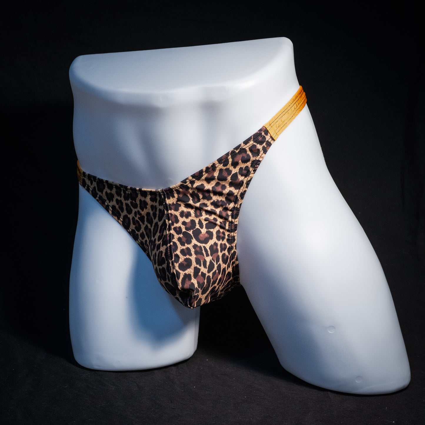 Men's leopard print thong underwear, classic cut, front view.