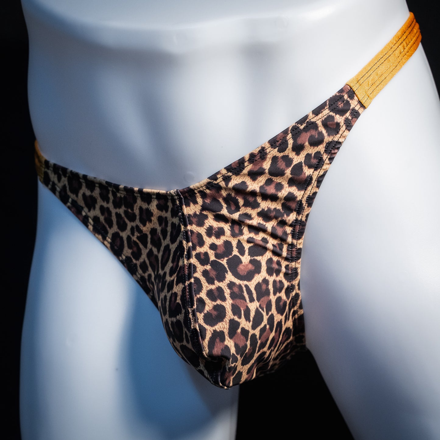 Men's leopard print thong underwear, classic cut, front view.
