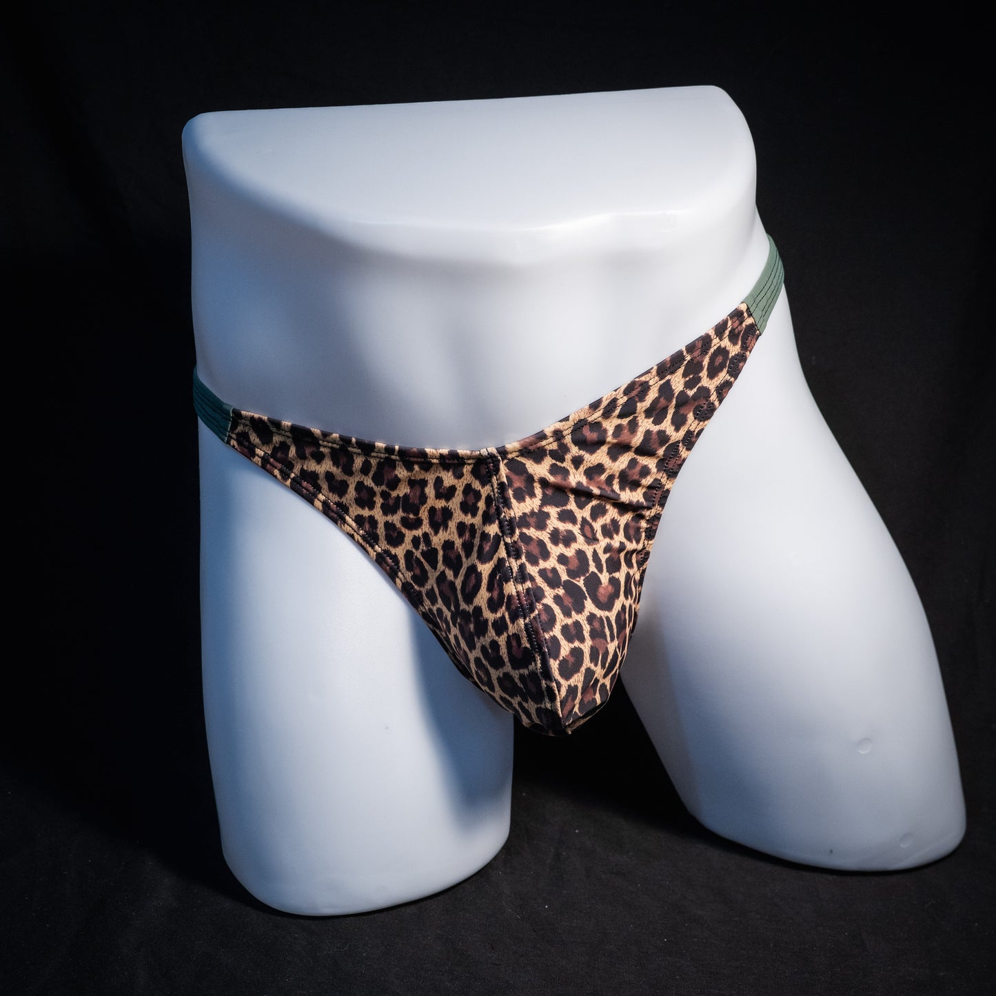 Men's leopard print thong underwear, classic cut, front view.