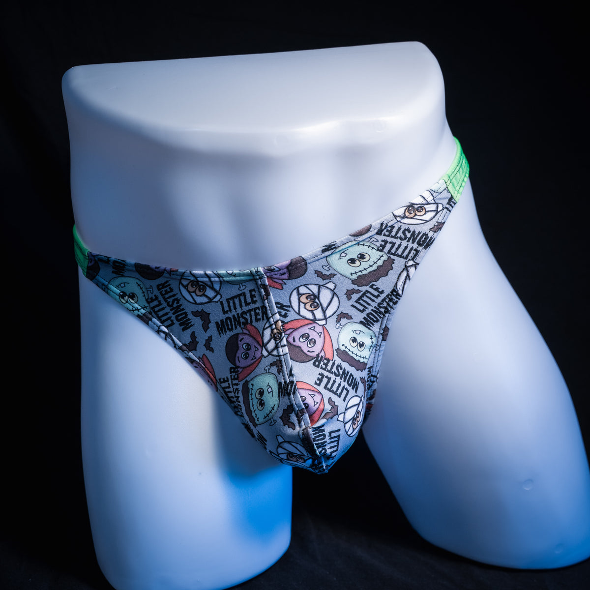 Men's little monsters Halloween themed thong underwear, classic cut, front view.