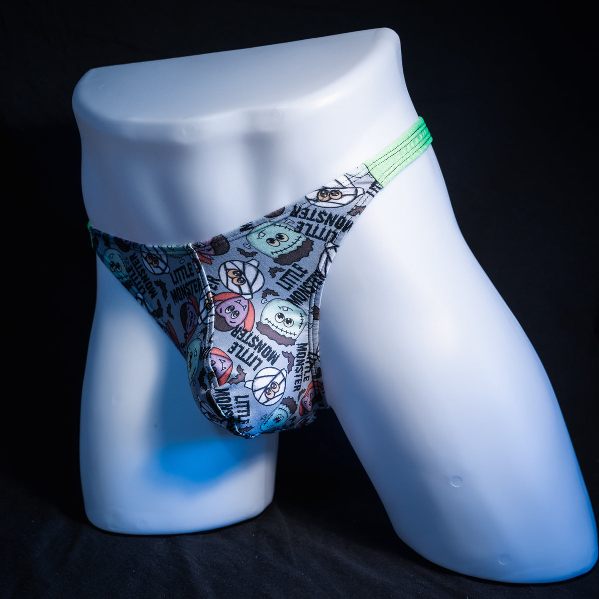 Men's little monsters Halloween themed thong underwear, classic cut, front view.