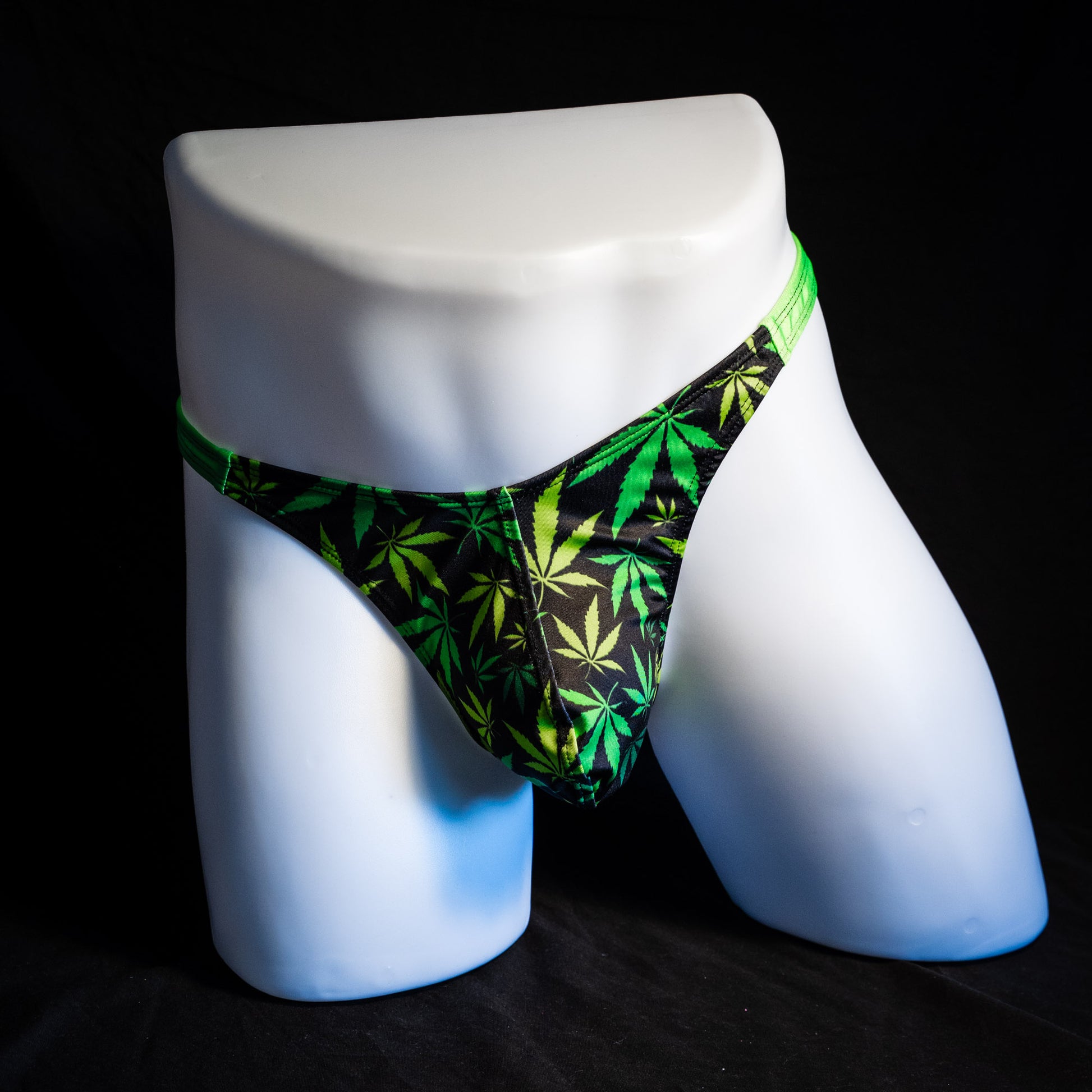 Men's marijuana print thong underwear, classic cut, full front view.