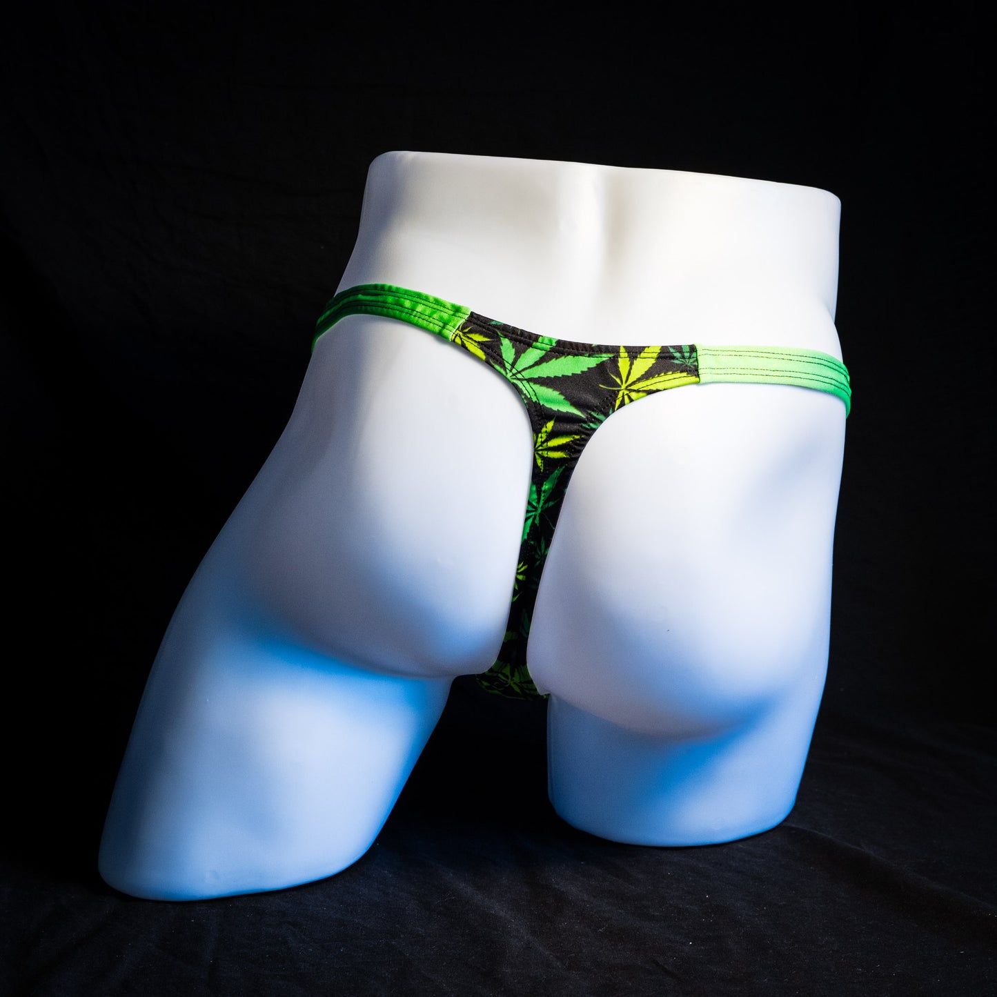Men's marijuana print thong underwear, classic cut, full rear view.