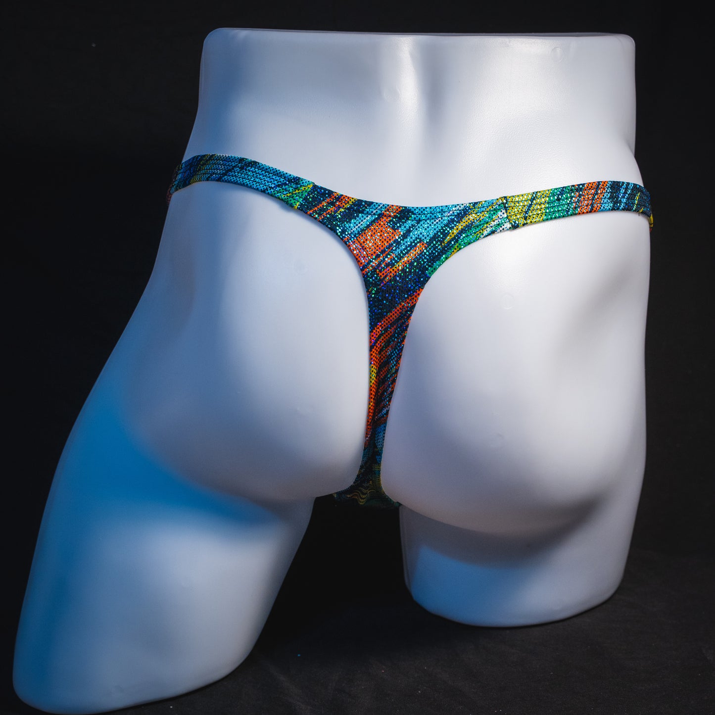 Men's metallic sparkle thong underwear, classic cut, full rear view.