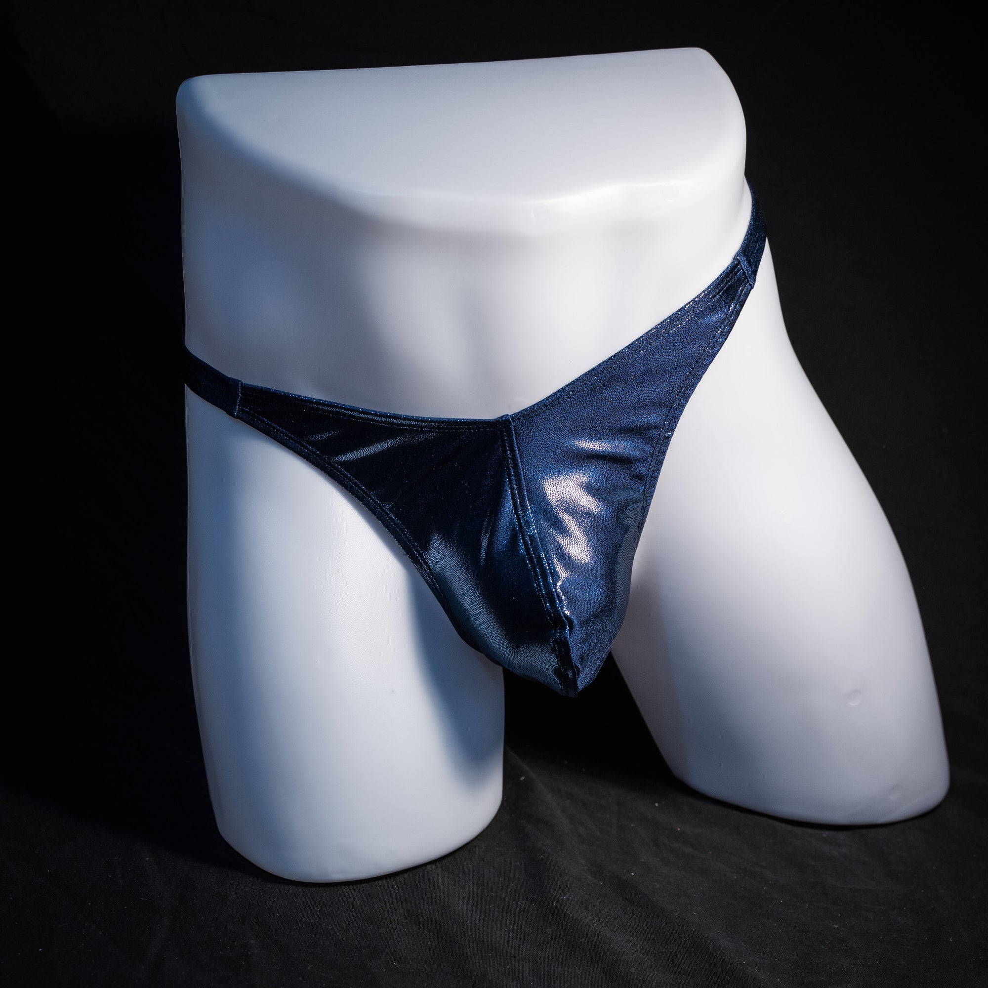 Men's navy blue metallic thong underwear, classic cut, front view.