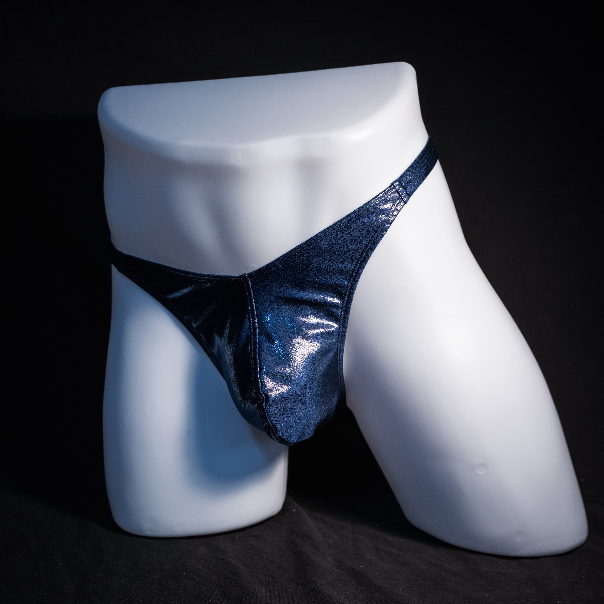 Men's navy blue metallic thong underwear, classic cut, front view.