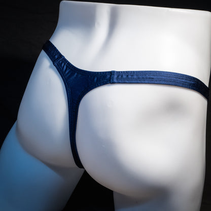 Men's navy blue thong underwear, classic cut, rear view.