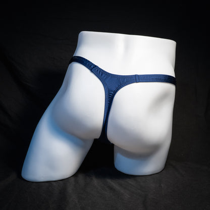 Men's navy blue thong underwear, classic cut, rear view.
